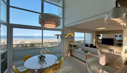 Apartamento diferenciado com pé direito duplo sacada com vista  para mar em Torr