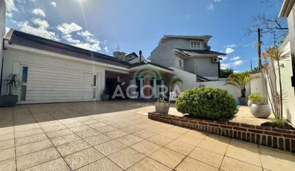 Excelente casa térrea com 4 dormitórios, sendo 2 suítes no bairro Bela Vista.