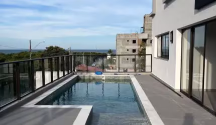 Apartamento com vista mar e escritura publica aproximadamente 250 metros do mar, na praia do Santinho, Florianópolis/SC.