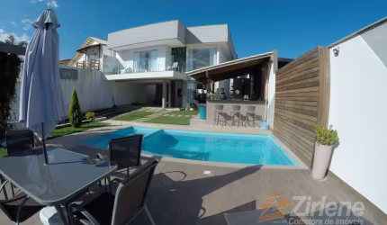 MARAVILHOSA CASA NA ENSEADA. COM FINO ACABAMENTO E ÁREA DE LAZER.