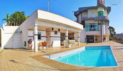 Casa com 6 suítes, no Condomínio Bosque Imperial, estuda permuta.