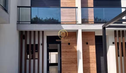 Casa em condomínio á venda de 74m², com 2 dormitórios sendo 2 suítes no Bairro d