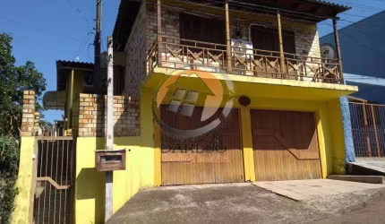 SOBRADO DE ALVENARIA COM 2 CASAS NO PÁTIO AO LADO DA AV. RUBEM BERTA