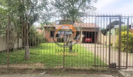CASA DE ALVENARIA COM 4 DORMITÓRIOS NA AV. LUCIO BITTENCURT