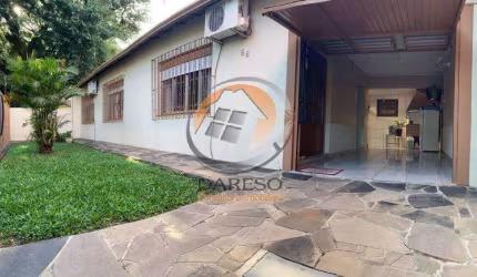 LINDA CASA DE ALVENARIA COM 3 DORMITÓRIOS NO CENTRO DA CIDADE