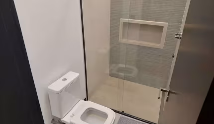 Casa com 4 suítes, 4 vagas de garagem, e 372 m² privativos em Ibiraquera - Imbituba/SC