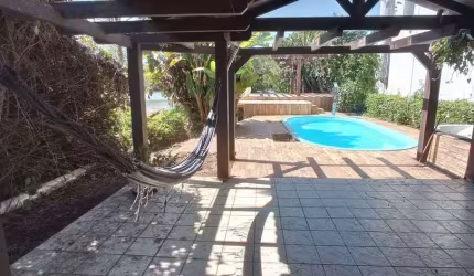 Casa com 4 dormitórios (2 suítes) à venda, 326 m² - Lagoa da Conceição - Florianópolis/SC (TRAPICHE EXLUSIVO COM ACESSO À LAGOA)