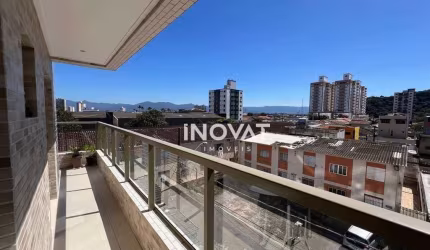 Apartamento com 2 dormitórios à venda, 61 m² por R$ 560.000,00 - Boqueirão - Praia Grande/SP