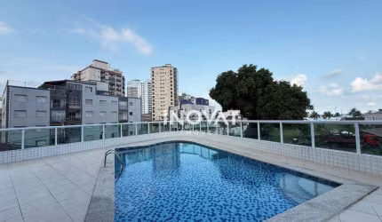 Apartamento com 2 dormitórios à venda, 74 m² por R$ 520.000,00 - Caiçara - Praia Grande/SP