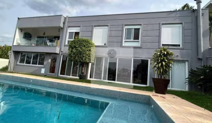 Casa com 5 dormitórios, 402 m² - venda por R$ 2.650.000,00 ou aluguel por R$ 16.554,91/mês - Caminhos de San Conrado - Campinas/SP