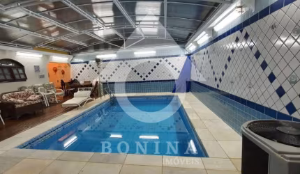 Elegante residência à venda no Condomínio Jardim Santa Tereza, com piscina aquecida!
