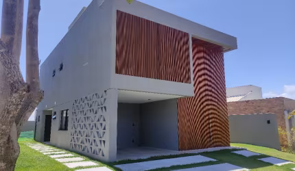 Casa duplex com piscina e conceito aberto no Alphaville Litoral Norte 2