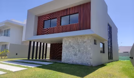 Casa duplex com piscina com Arquitetura moderna no Alphaville Litoral Norte 2