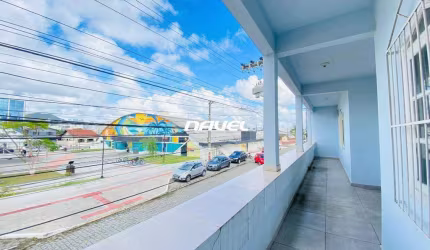 Imóvel Comercial com Duas Frentes e Terreno Amplo no Centro de Navegantes