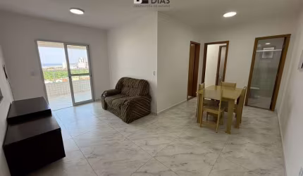 Apartamento vista mar para locação na Mirim - 2 dormitórios, sendo 1 suíte.
