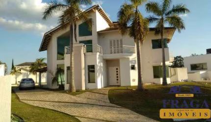 CASA COND. FECHADO C/ 530M² | 4 SUÍTES | 6 VAGAS