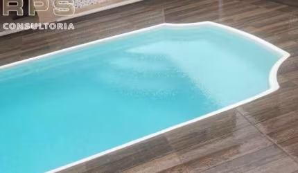 Casa no Nova Cerejeiras com 02 suites Sala de estar e sala de jantar  Lavabo, 02 banheiros, 02 vagas ,Quintal , lavanderia  Churrasqueira e piscina