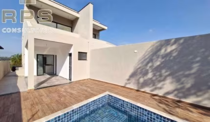 Casa pronta para morar no Jardim Paulista em Atibaia, 3 suítes com sacadas, salas e cozinha integradas, espaço gourmet, piscina e área verde!
