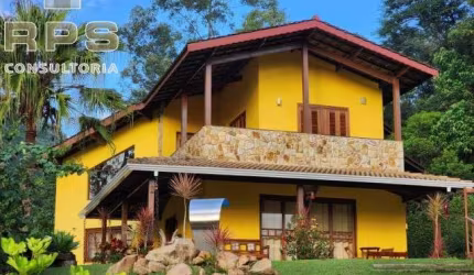 Casa a venda no Condomínio Palavra da Vida com 3 suítes e piscina climatizada, área gourmet com churrasqueira, vaga para 08 carros, portaria 24hrs