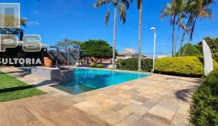 Casa térrea no Jardim Itaperi em Atibaia , com 04 dormitórios, 02 suites , escritório, cozinha planejada , área gourmet com piscina aquecida e sauna