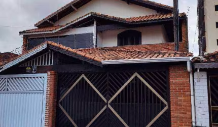 Sobrado com 3 dormitórios à venda, 100 m² por R$ 630.000,00 - Ocian - Praia Grande/SP