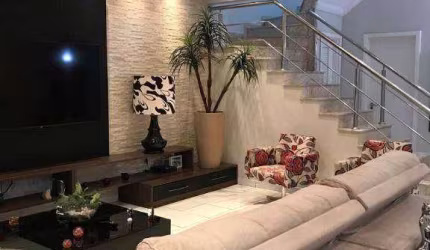 Sobrado com 4 dormitórios à venda, 172 m² por R$ 920.000,00 - Boqueirão - Praia Grande/SP