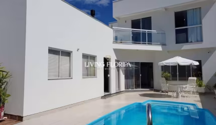 Casa com 3 quartos à venda na Rua Ipê Rosa, 258, Carianos, Florianópolis por R$ 1.980.000