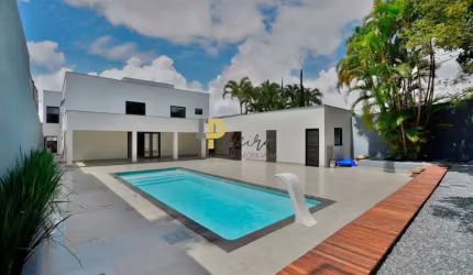 Luxo e Conforto no Jardim Botânico: Casa de 5 Suítes com 815m² e Área de Lazer Completa,