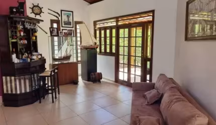 Casa em condomínio fechado com 5 quartos à venda no Jauá, Camaçari  por R$ 2.100.000