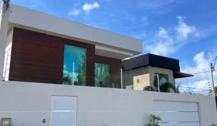Casa em condomínio fechado com 4 quartos à venda no Jauá, Camaçari  por R$ 900.000