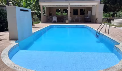 Casa em condomínio fechado com 3 quartos à venda no Jauá, Camaçari  por R$ 1.200.000