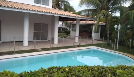 Casa em condomínio fechado com 5 quartos à venda na Praia de Busca Vida, Camaçari  por R$ 2.600.000