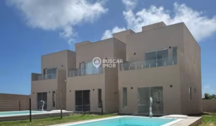 Casa em condomínio fechado com 3 quartos à venda na Barra do Jacuípe, Camaçari  por R$ 600.000
