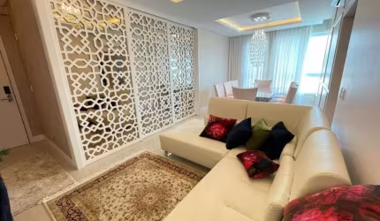 APARTAMENTO NO CENTRO DE CAMBORIU - UMA SUITE MAIS UM DORMITORIO MOBILIADO