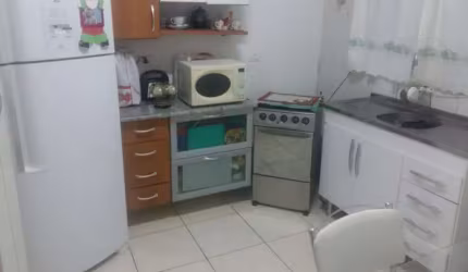 CASA A VENDA,  SOBRADO, 02 DORMITÓRIOS, AMPLA SALA, PARA 02 AMBIENTES, COZINHA, 02 BANHEIROS, ESPAÇOSA ÁREA DE SERVIÇO. 01 VAGA DE GARAGEM +MOTO.