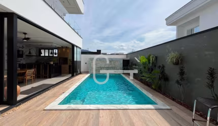 Casa com 4 dormitórios à venda, 320 m² por R$ 2.500.000,00 - Condomínio Flora Rica - Peruíbe/SP