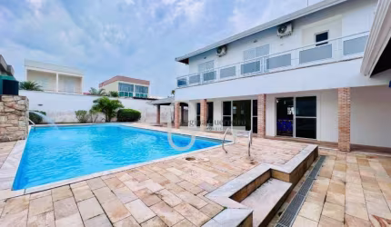 Casa com 4 dormitórios à venda, 255 m² por R$ 1.200.000,00 - Residencial Três Marias - Peruíbe/SP