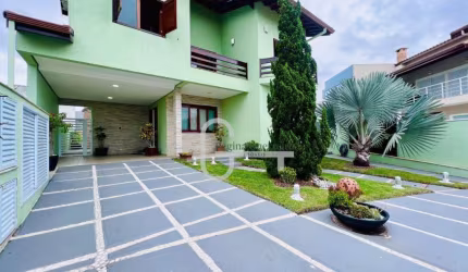 Casa com 4 dormitórios à venda, 241 m² por R$ 1.400.000,00 - Residencial Três Marias - Peruíbe/SP