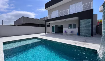 Casa com 3 dormitórios à venda, 227 m² por R$ 1.650.000,00 - Bougainvillee IV - Peruíbe/SP