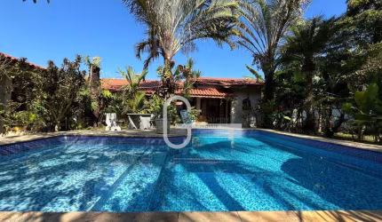 Casa com 3 dormitórios à venda, 198 m² por R$ 950.000,00 - Bougainvillee V - Peruíbe/SP