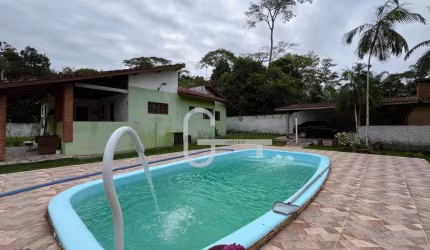 Casa com 4 dormitórios à venda, 217 m² por R$ 990.000,00 - Condomínio Residencial São Marcos - Peruíbe/SP