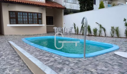 Casa com 4 dormitórios à venda, 183 m² por R$ 650.000,00 - Balneário Três Marias - Peruíbe/SP