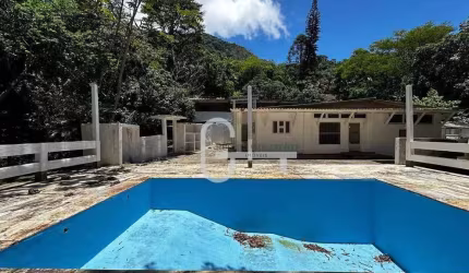 Casa com 5 dormitórios à venda, 388 m² por R$ 1.500.000,00 - Parque Peruibe - Peruíbe/SP