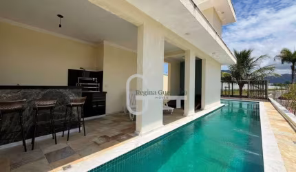 Casa com 4 dormitórios à venda, 518 m² por R$ 3.500.000,00 - Condomínio Flora Rica - Peruíbe/SP