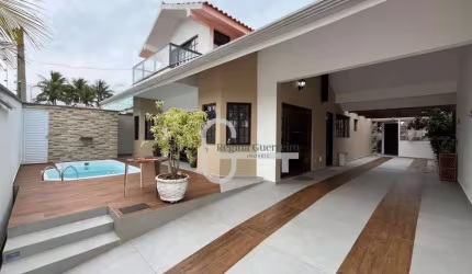 Casa com 3 dormitórios à venda, 150 m² por R$ 879.000,00 - Parque Turístico - Peruíbe/SP