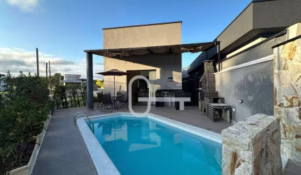 Casa com 3 dormitórios à venda, 170 m² por R$ 990.000,00 - Residencial Bosque Três Marias  - Peruíbe/SP