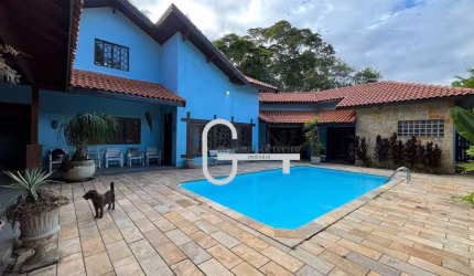 Casa com 4 dormitórios à venda, 230 m² por R$ 980.000,00 - Condomínio Residencial São Marcos - Peruíbe/SP