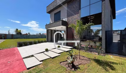 Casa com 4 dormitórios à venda, 262 m² por R$ 2.000.000,00 - Condomínio Flora Rica - Peruíbe/SP