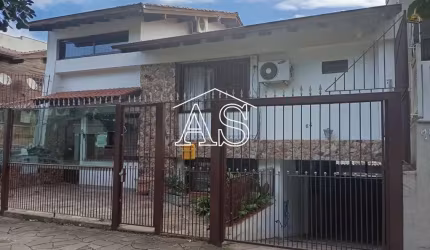 Casa com 4 quartos à venda na Rua Professor Ulisses Cabral, 64, Chácara das Pedras, Porto Alegre, 396 m2 por R$ 1.530.000