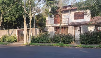 Casa com 4 quartos à venda na Avenida Fábio Araújo Santos, 1212, Nonoai, Porto Alegre por R$ 1.990.000